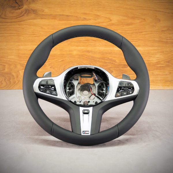 BMW X7 steering wheel after upholstery BMW X7 steering wheel after upholstery