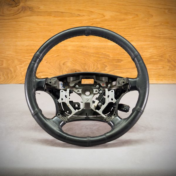 Toyota Land Cruiser steering wheel before modification