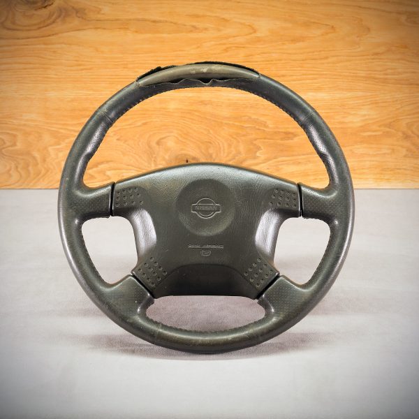 Nissan Patrol steering wheel before modification