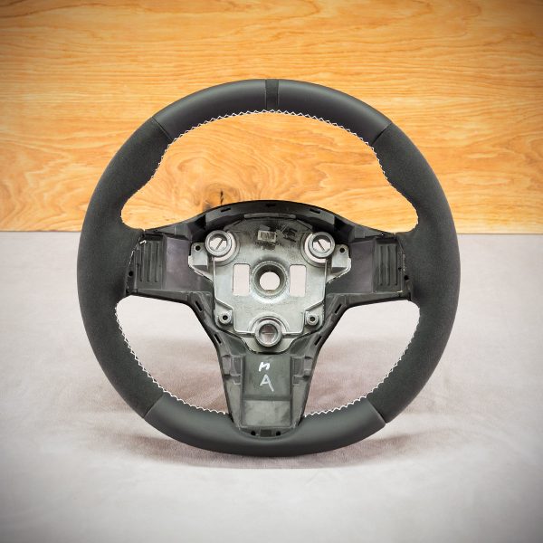 Tesla Model 3 steering wheel after upholstery Tesla Model 3 steering wheel after upholstery
