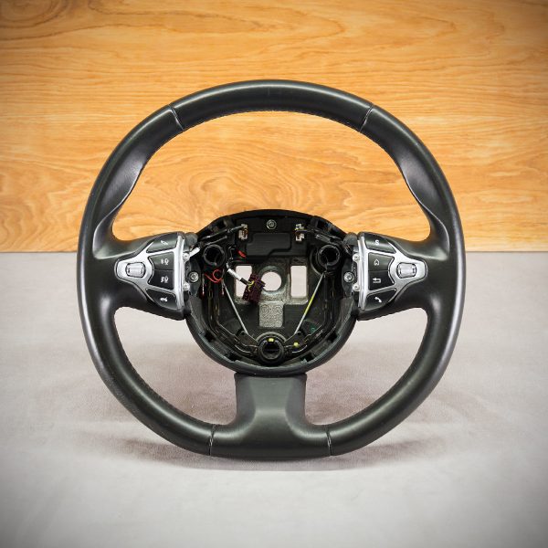 Aston Martin BD11 steering wheel before modification